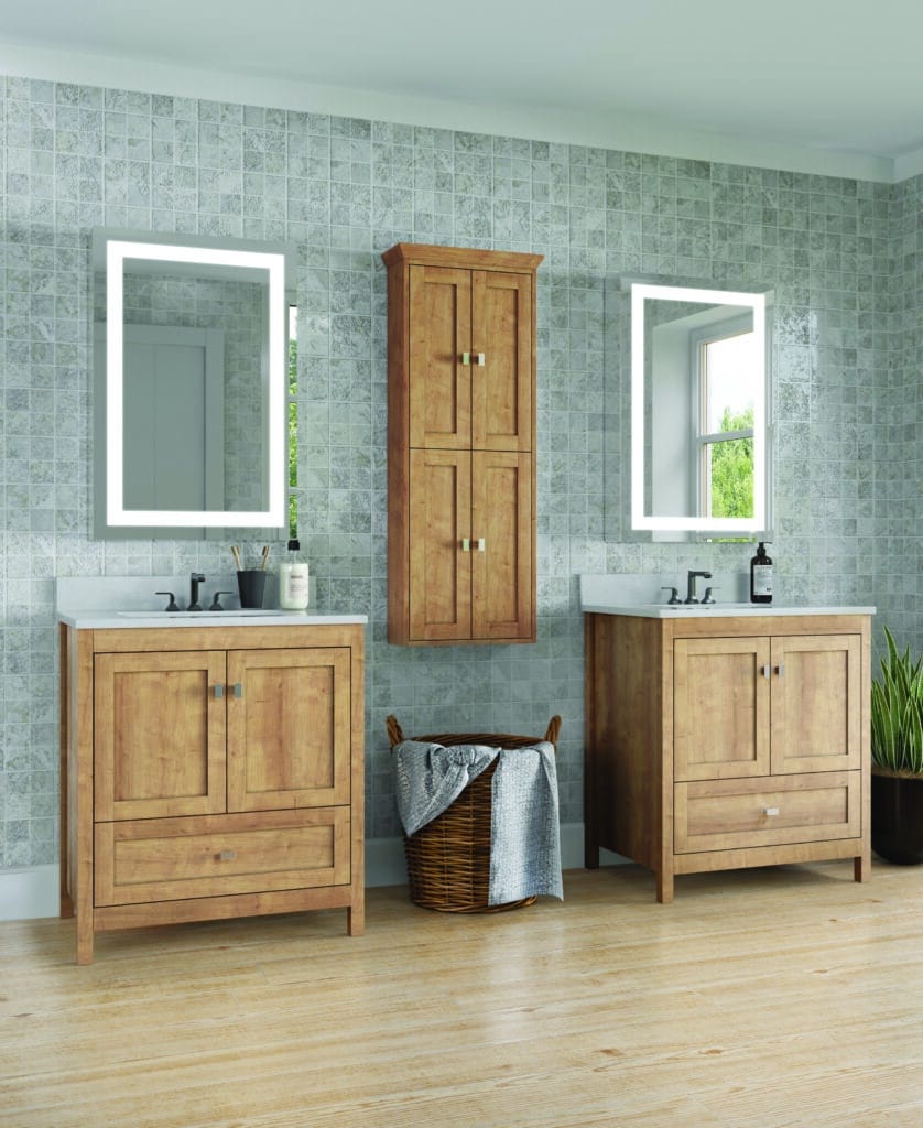 Two light wood vanities with white tops and two vertical LED-backlit mirrors separated by a matching wood wall cabinet from Strasser.